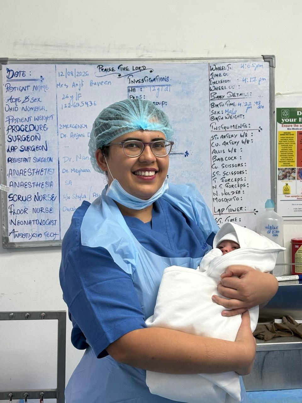 Dr. Anjani Dixit with newborn — delivery moment 17